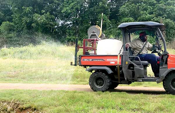 Custom RTV spray systems easily treat bike trails and walking paths